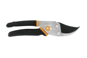 Studio-style image of Fiskars bypass pruning shears featuring black ergonomic handles with orange accents and a sharp, curved stainless steel blade, centered on a pure white background.